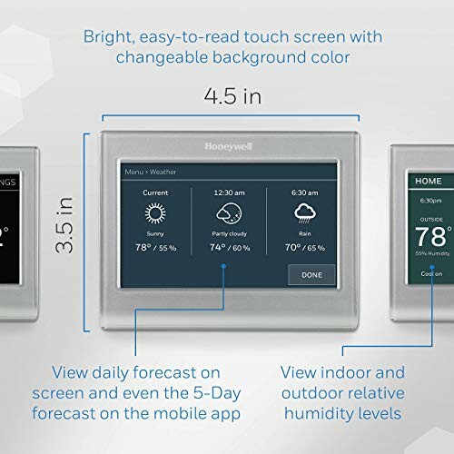 Digital thermostat with weather display showing temperature and humidity.