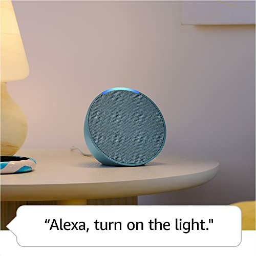 Smart speaker on a table with a voice command.