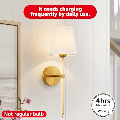 Gold wall sconce with white shade, note about frequent charging.